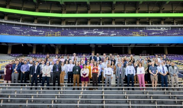 Group of new faculty in Tiger Stadium