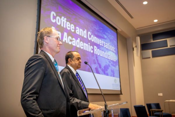 Roy Haggerty and Bijoy Sahoo at an event for the A&M agenda