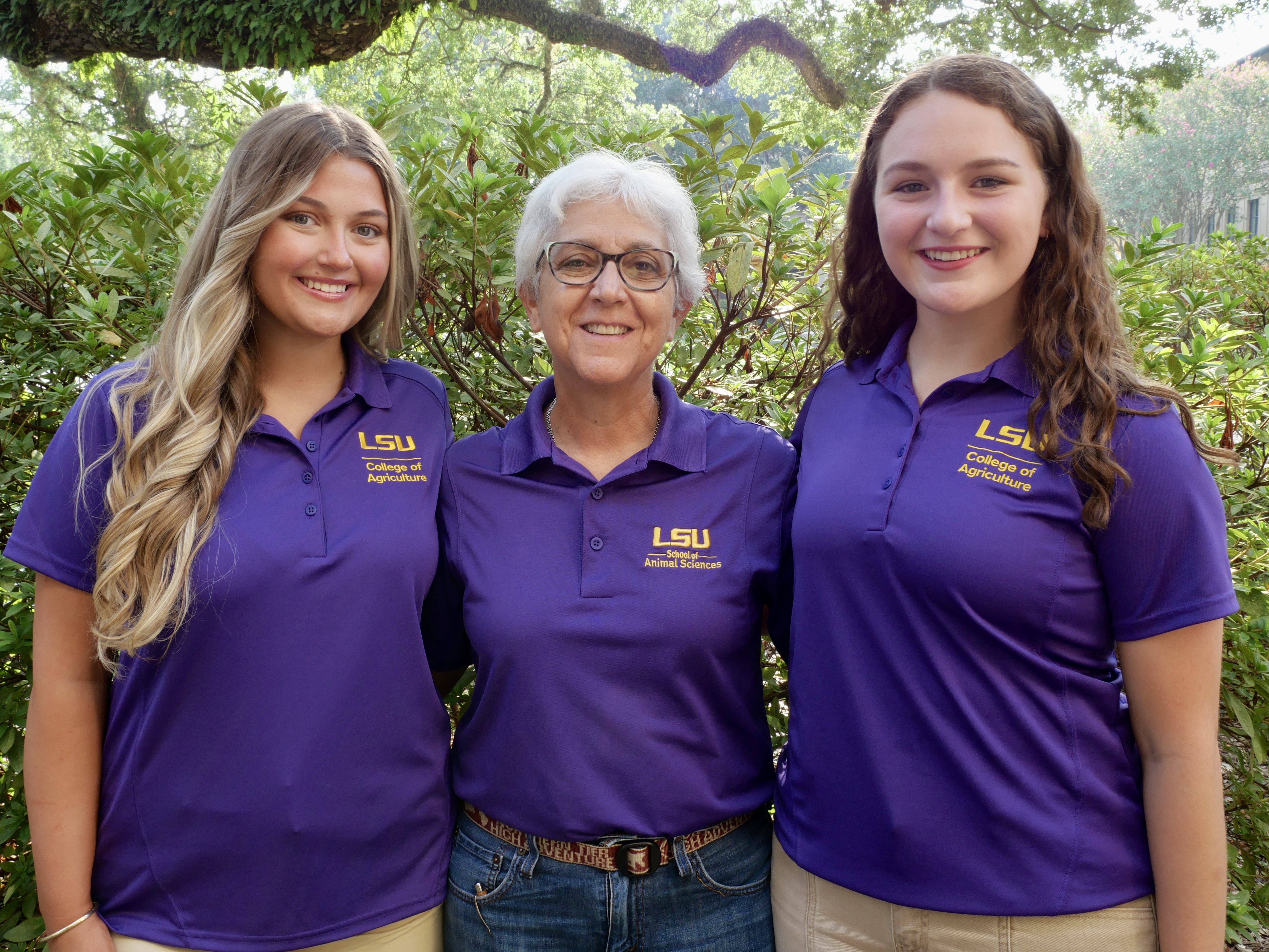 Lindsay Barelycorn stands with peer mentors, Chloe Viator and Francis DiSalvo