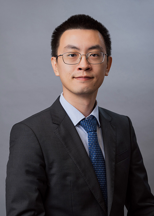 Ren Shuhao wears a dark suit in this studio headshot.