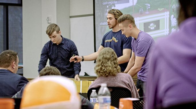 Students present their concept at startup weekend