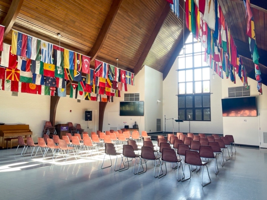 large hall with world flags hanging