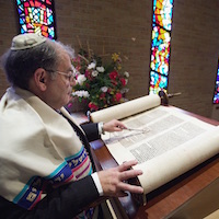 Rabbi gives sermon.