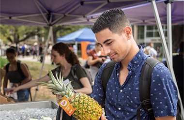 student at farmers market